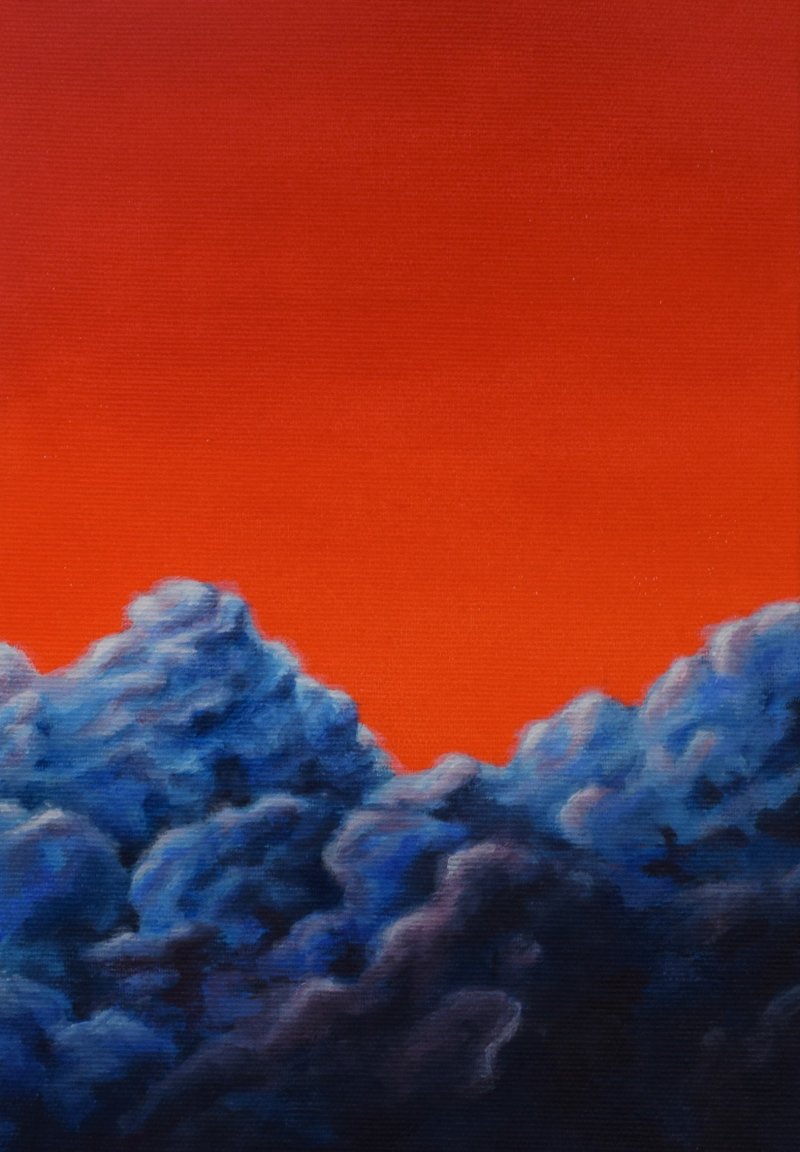 Orange himmel med klumpede blå skyer nr. 2.